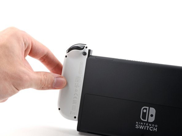 Шаг 2: Сними Joy-Con, фото 1